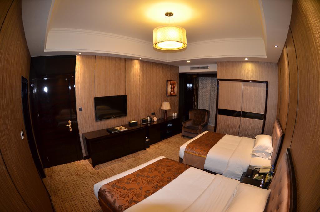 Wanjia International Hotel Куанжоу Екстериор снимка