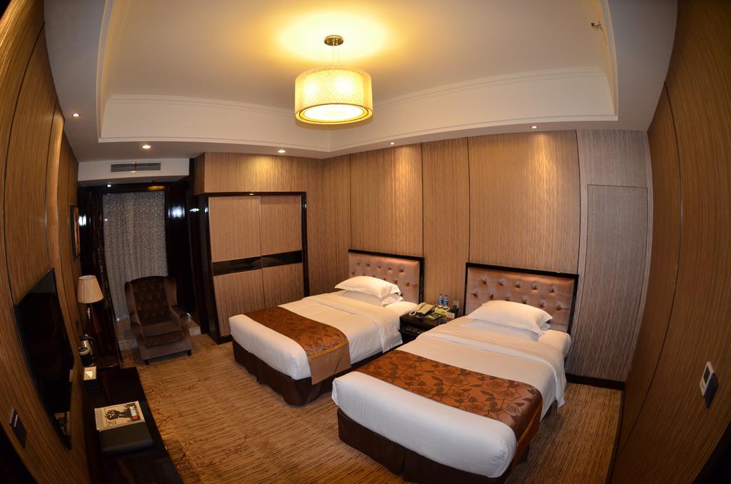 Wanjia International Hotel Куанжоу Екстериор снимка